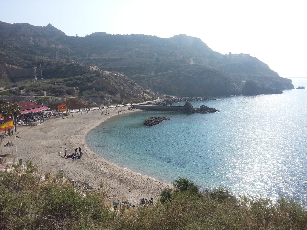 Sheltered beach and clear blue water at Cala Cortina near Cartagena