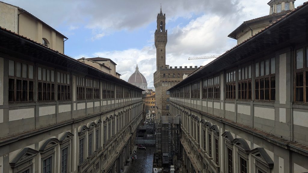 Long perspective along the Uffizi courtyard in Florence