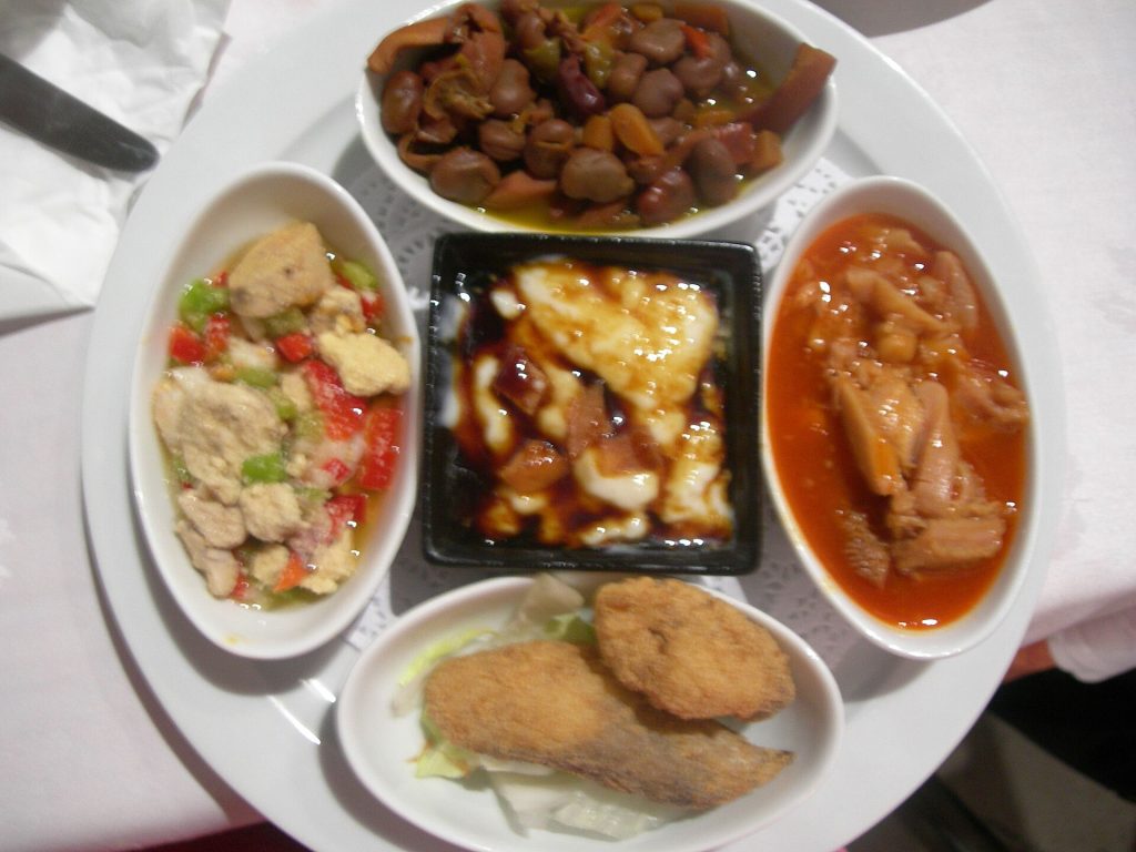 Selection of tapas dishes served on a table in Seville