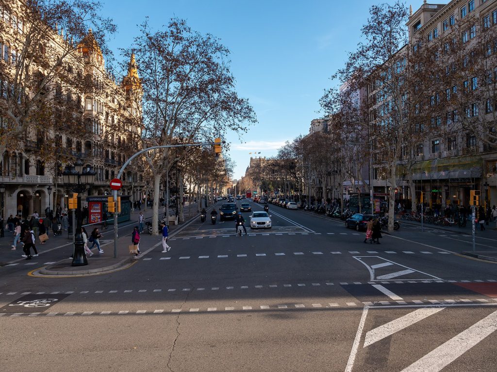 Wide street crossing in the Eixample district of Barcelona