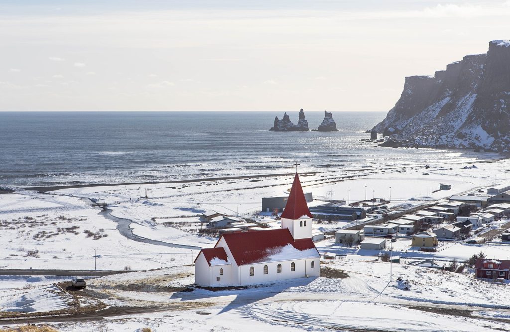 A village church in winter (Unsplash)